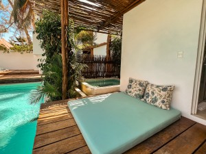 Swim up room pool access with private sofa at Cabanas Tulum Beach Hotel & Spa