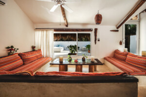 Living room sofas in the Vanilla Loft at Cabanas Tulum Beach Hotel & Spa