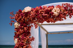 Wedding arch flower decoration on the beach